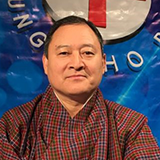 Dr. Tashi Tenzin